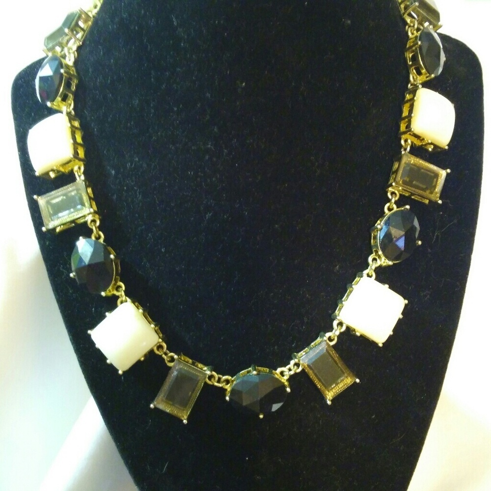 Gold tone necklace with large stones